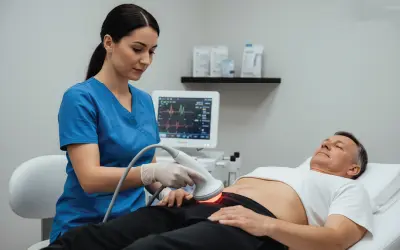 Healthcare provider performing radio frequency on male patient