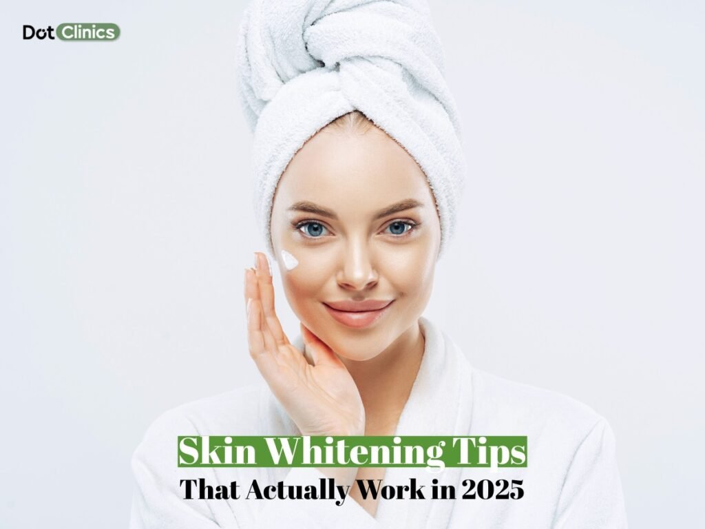 Woman applying cream on face in a spa robe, representing effective skin whitening tips in 2025 by Dot Clinics.