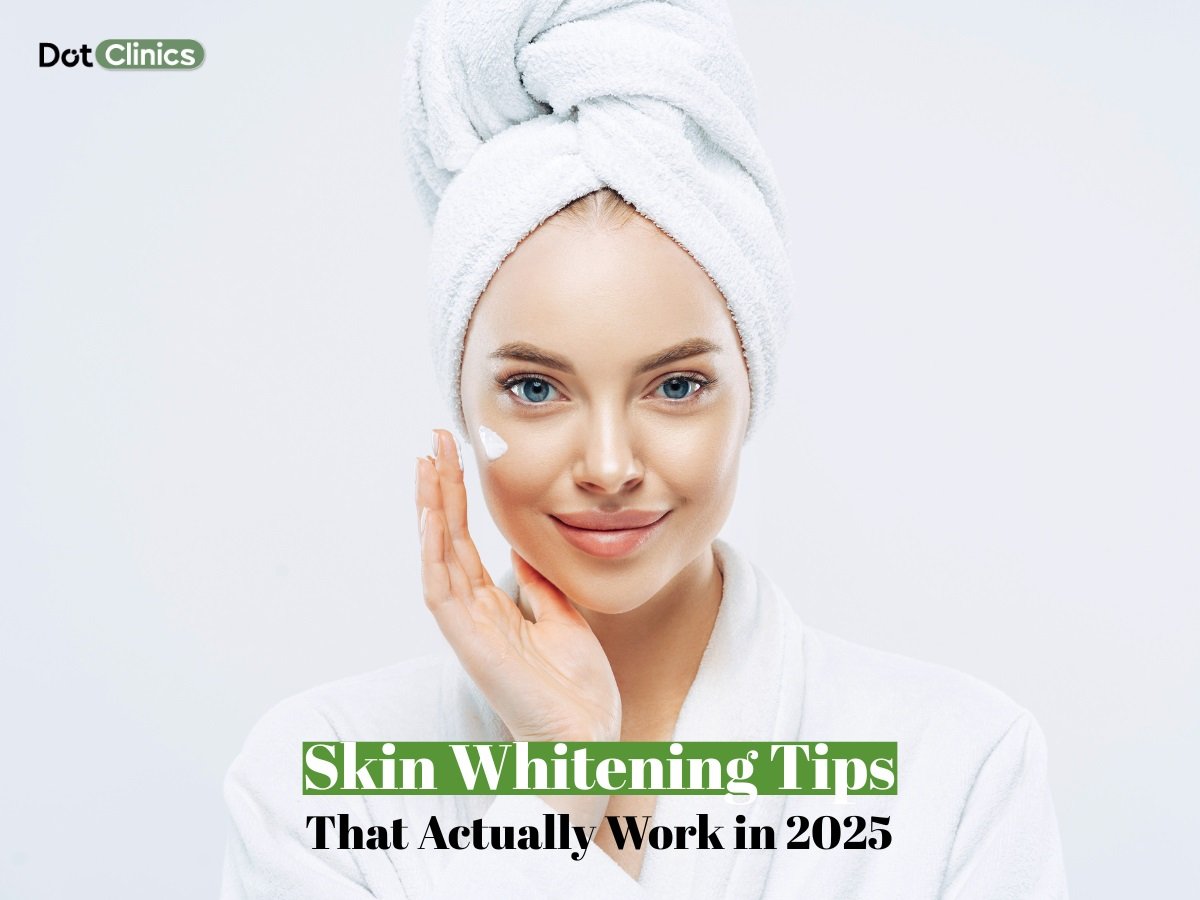 Woman applying cream on face in a spa robe, representing effective skin whitening tips in 2025 by Dot Clinics.